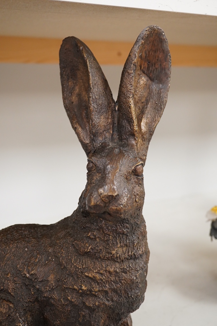 A patinated bronze figure of a hare, unsigned, 33.5cm high